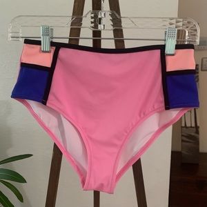 Towowge Women’s Swim Bottom in pink, peach and blue with black contrast stripe